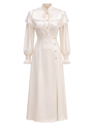 [Prévente] Robe beige à cape volantée, dentelle et manches ballon fendues années 1970 - 2