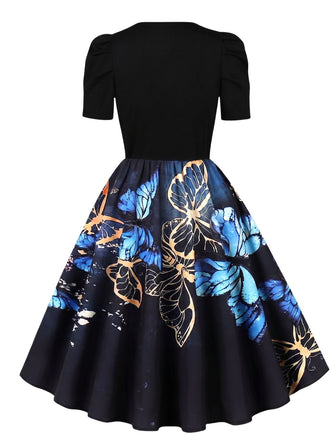Robe trapèze noire à imprimé papillons et manches bouffantes années 1940 - 2