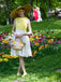 Robe patchwork jaune avec noeud papillon marguerite des années 1950