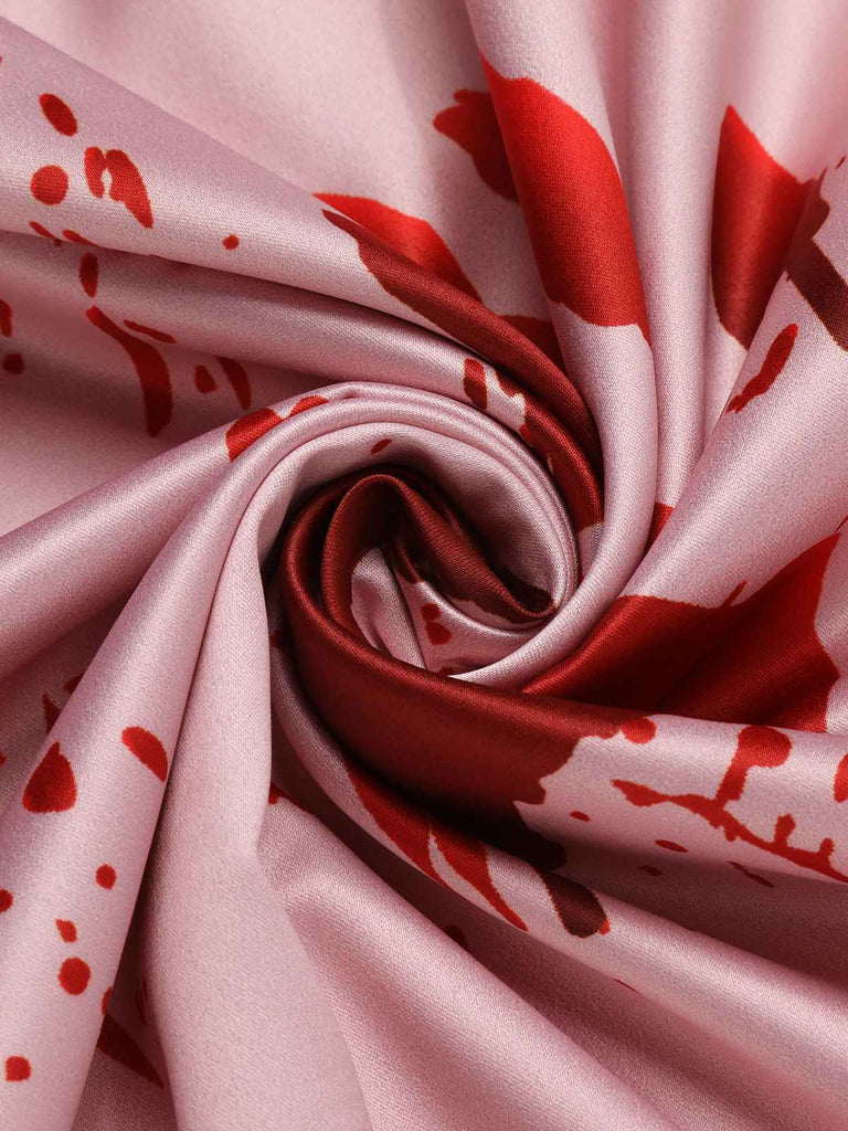Robe dos nu rose Halloween années 1950 avec taches de sang