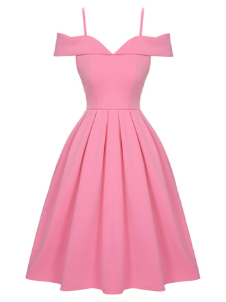 Robe rose à bretelles froides solides des années 1950