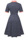 Robe à revers contrastée à pois bleu foncé des années 1950