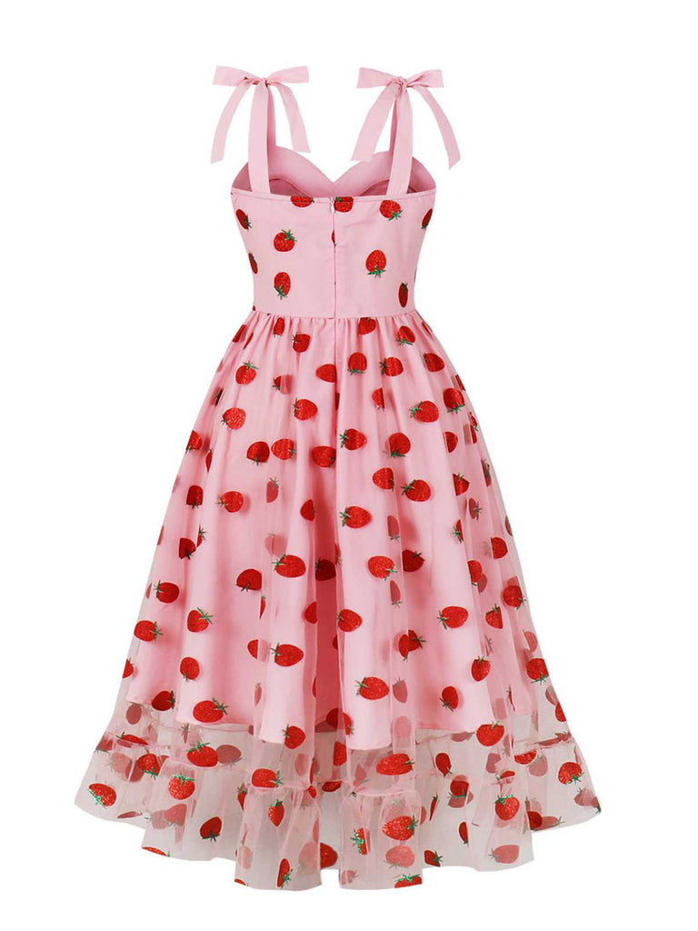 Robe rose fraise à bretelles spaghetti des années 1950