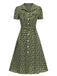 Robe marguerite à boutons revers vert des années 1950