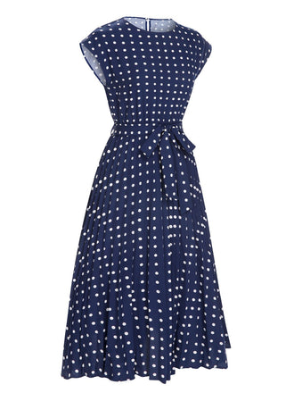 Robe à manches courtes à pois bleu royal des années 40