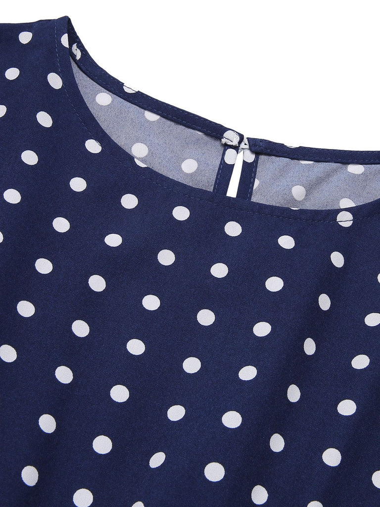 Robe à manches courtes à pois bleu royal des années 40