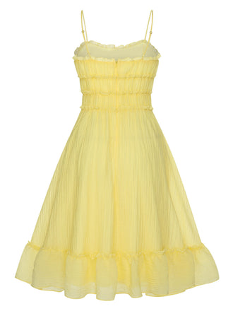 Robe jaune à bretelles spaghetti et ourlet à volants des années 40