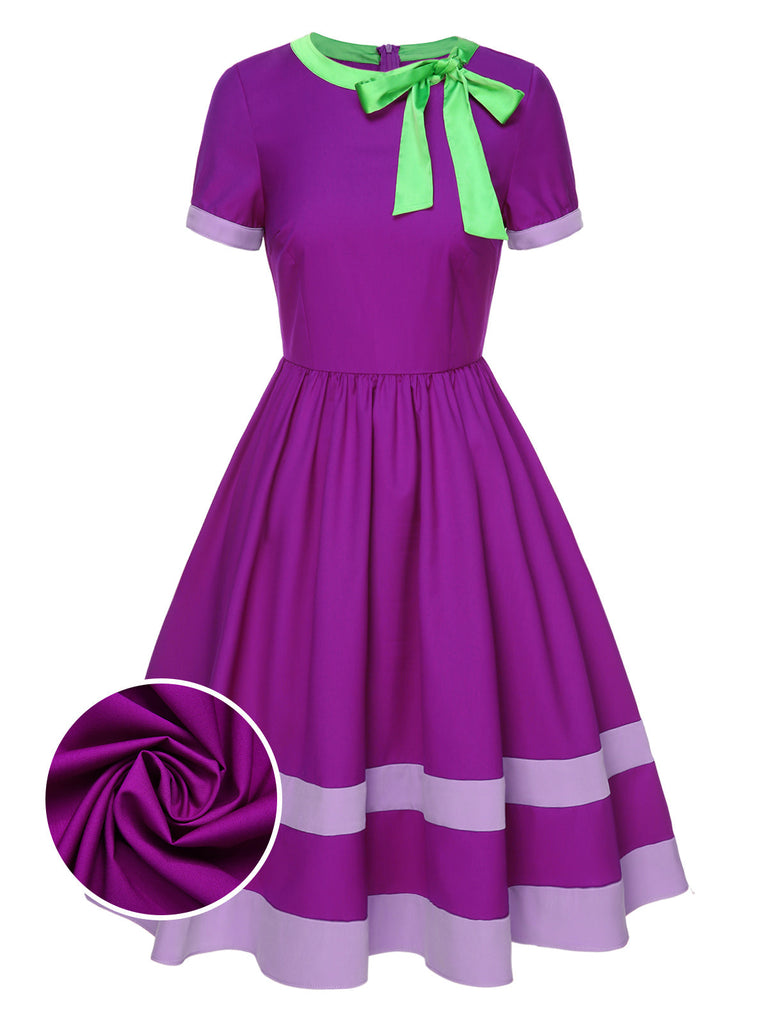 Robe violette unie à col noué des années 1950