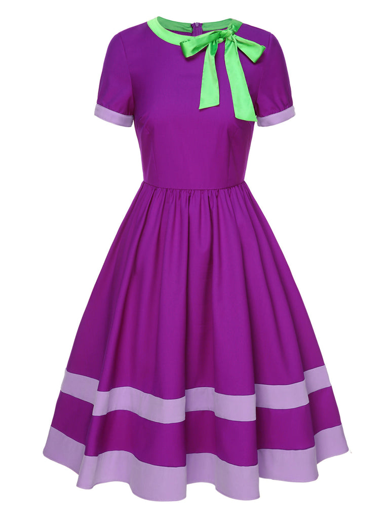 Robe violette unie à col noué des années 1950