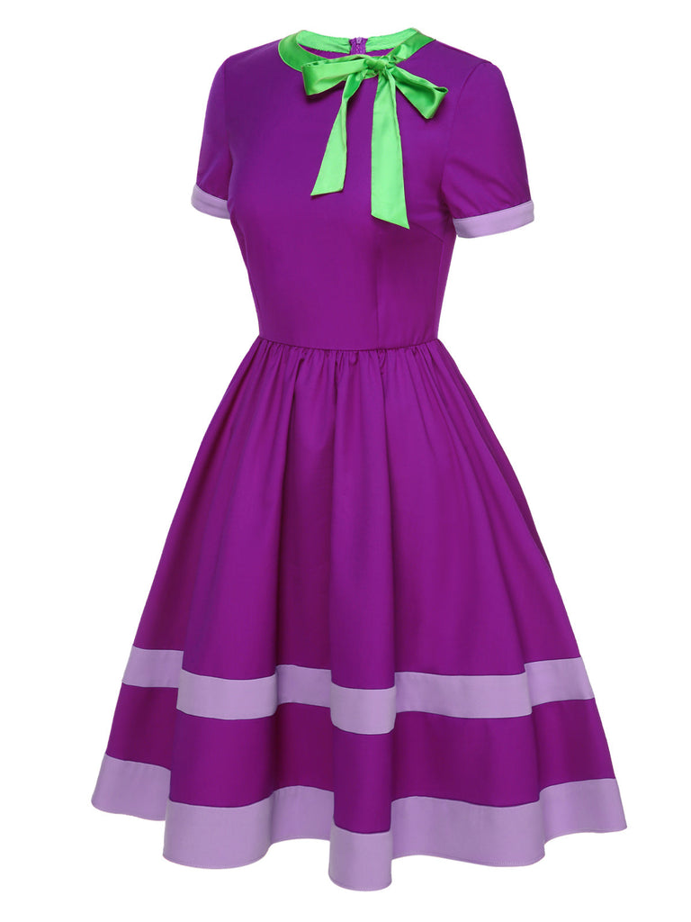 Robe violette unie à col noué des années 1950