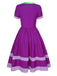 Robe violette unie à col noué des années 1950