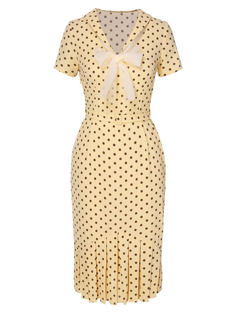 Robe plissée jaune à pois et revers des années 40