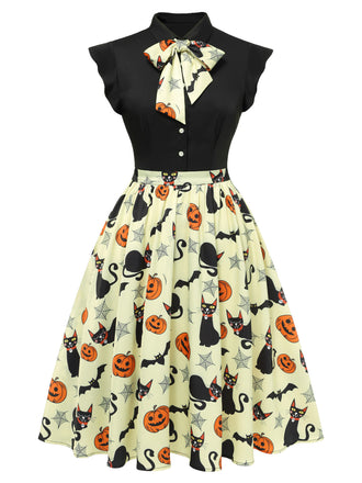 Robe jaune à revers avec nœud pour Halloween des années 1950