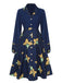 Robe fleurie bleu foncé à revers des années 1940