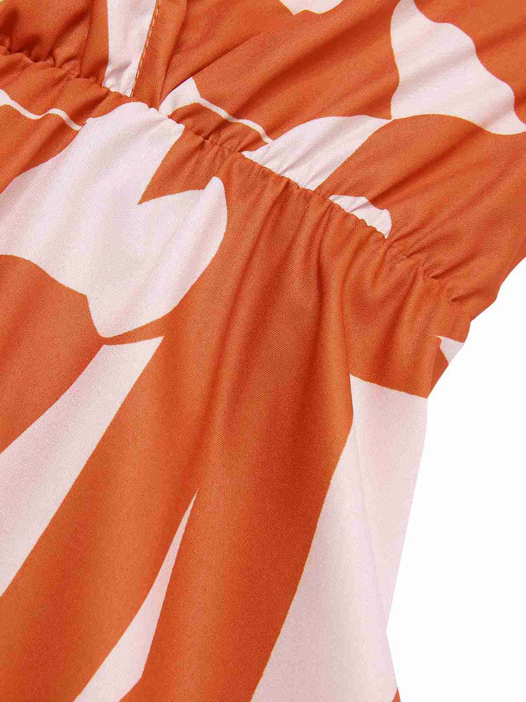 Robe à col en V à volants géométriques orange rouge des années 1940