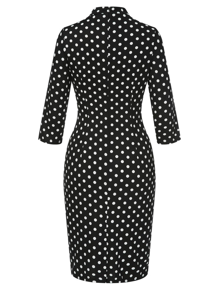 Robe noire à pois et col noué des années 1960