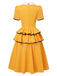 Robe jaune revers avec nœud jupe multicouche des années 1950