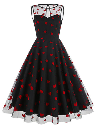 Robe patchwork noire en maille à cœur floqué des années 1950