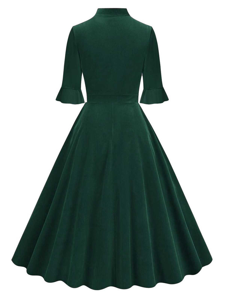 Robe à manches évasées en velours avec col noué des années 1950