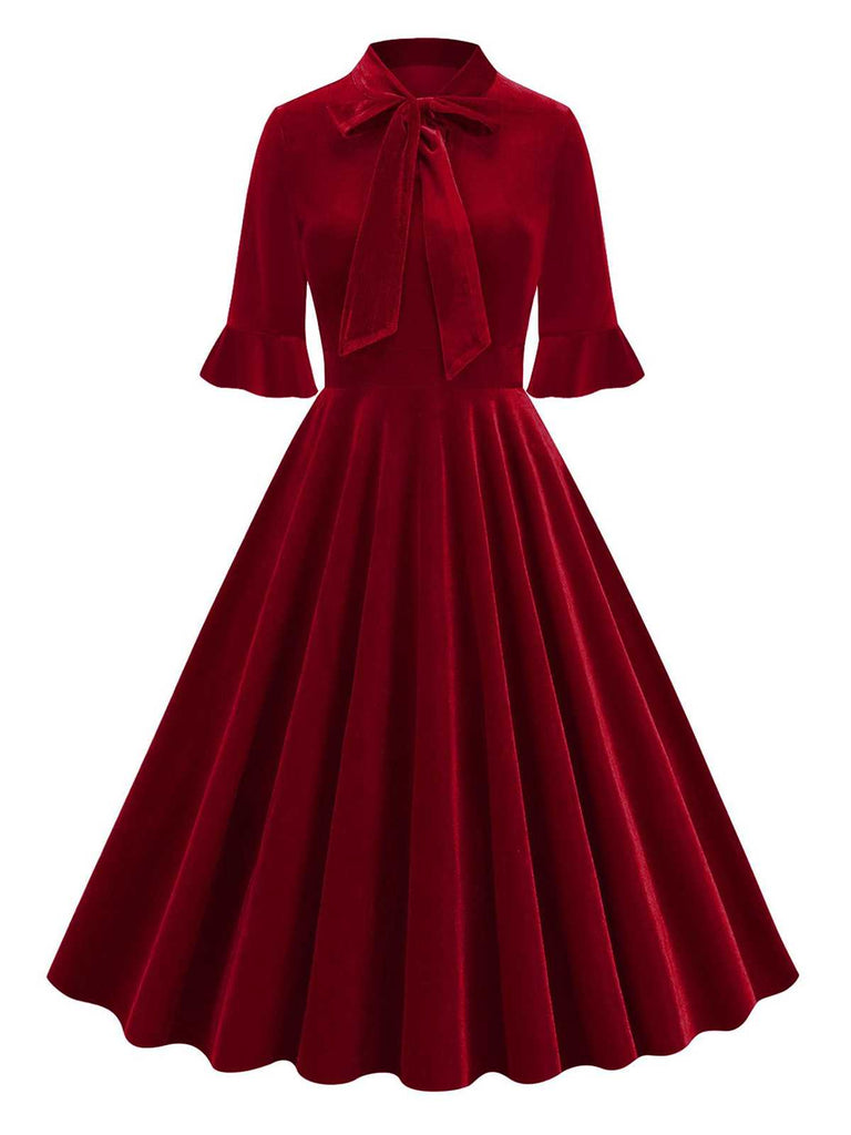 Robe à manches évasées en velours avec col noué des années 1950