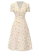 Robe bleu à manches bouffantes et revers fleuris des années 1940