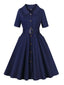 Robe ceinturée à revers bleu foncé des années 1950