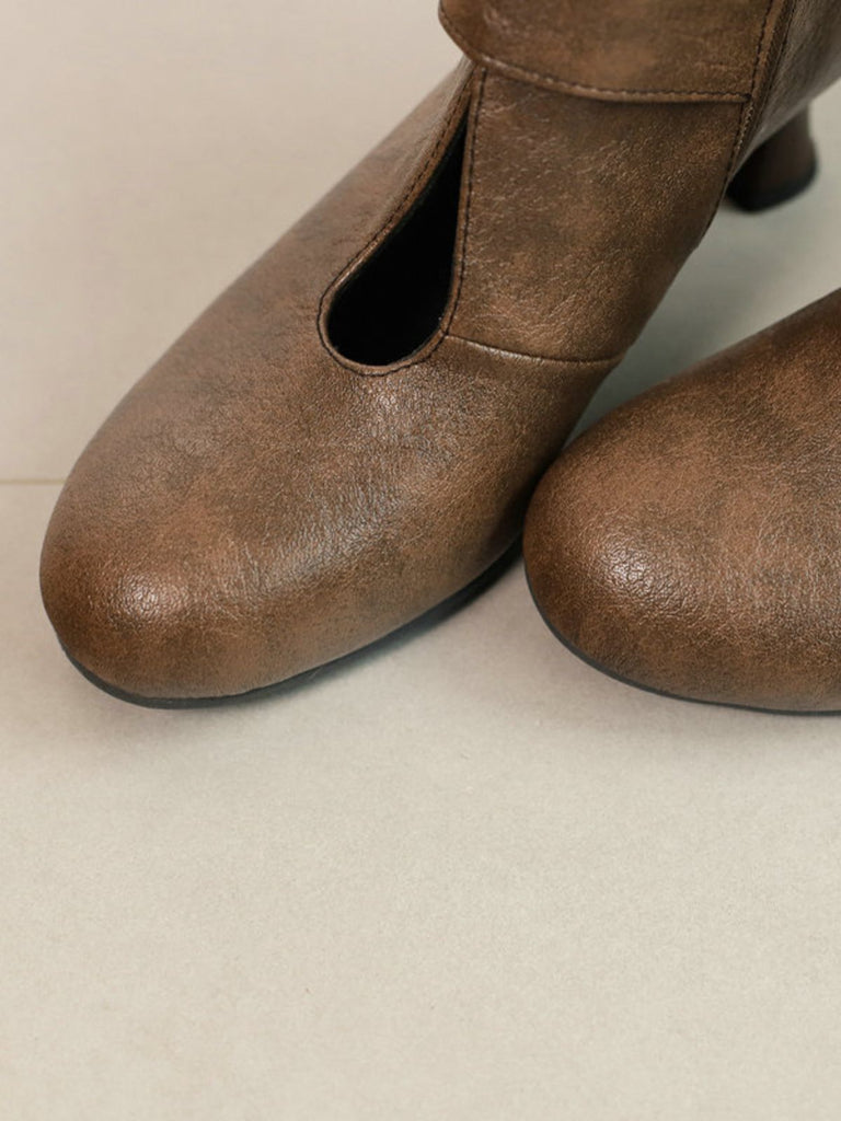 Bottines à bout rond, découpes, boucle et talon bloc