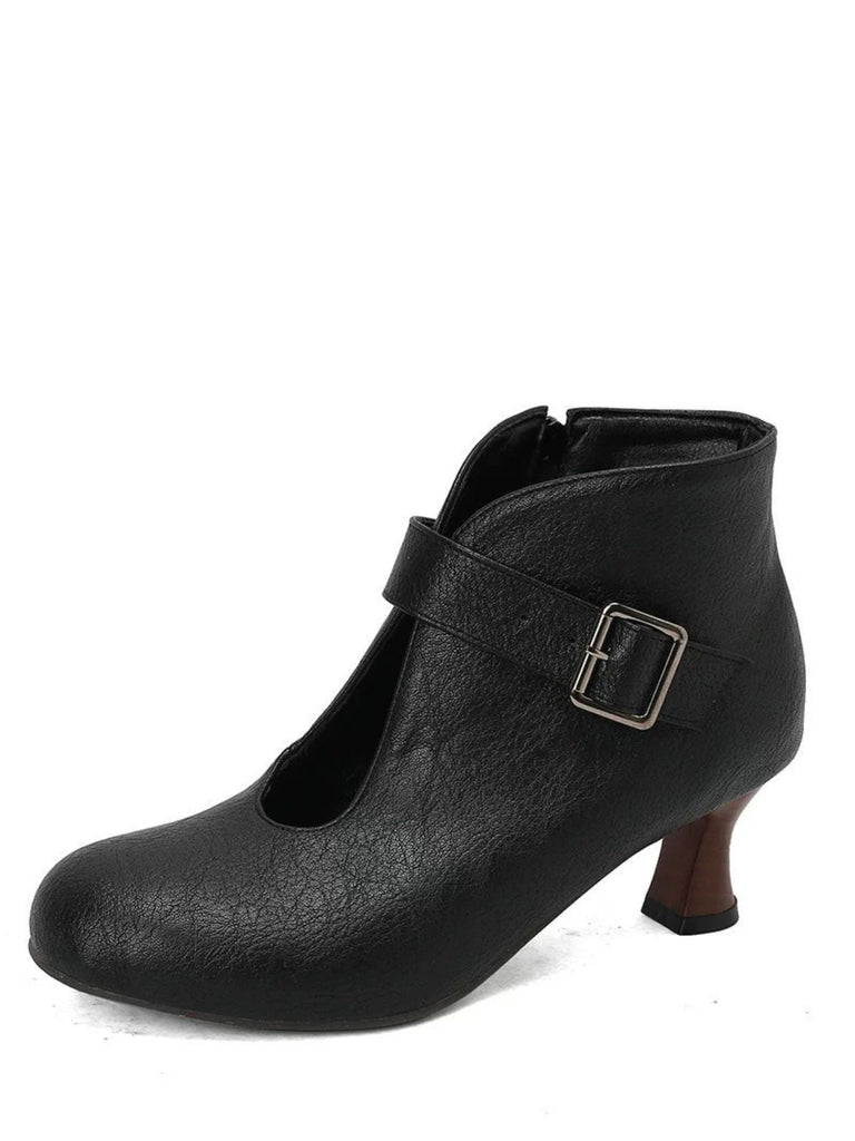 Bottines à bout rond, découpes, boucle et talon bloc