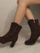 Bottes mi-mollet cloutées en daim doublées de fausse fourrure