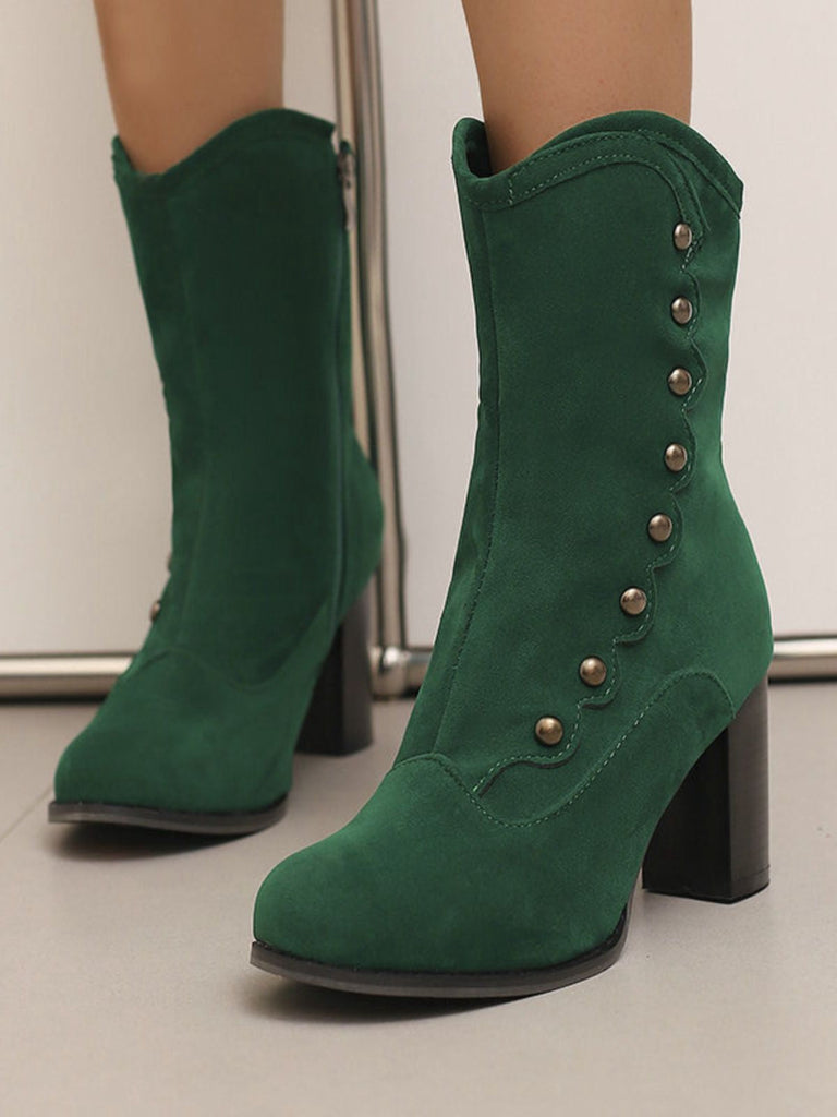 Bottes mi-mollet cloutées en daim doublées de fausse fourrure