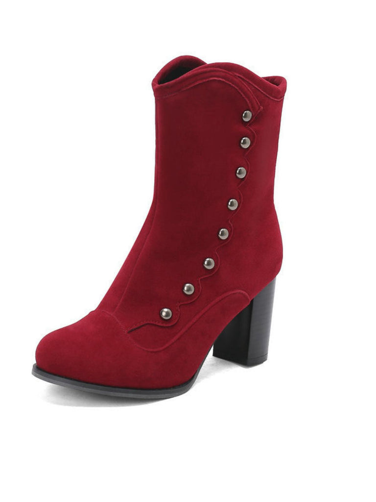 Bottes mi-mollet cloutées en daim doublées de fausse fourrure