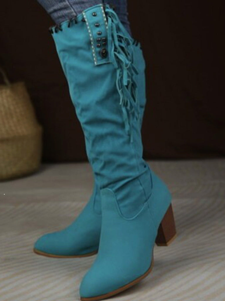 Bottes hautes marron en daim à pompons ethniques et talon épais