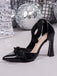 Chaussures à talons hauts en cuir verni et daim, nœud et bout pointu