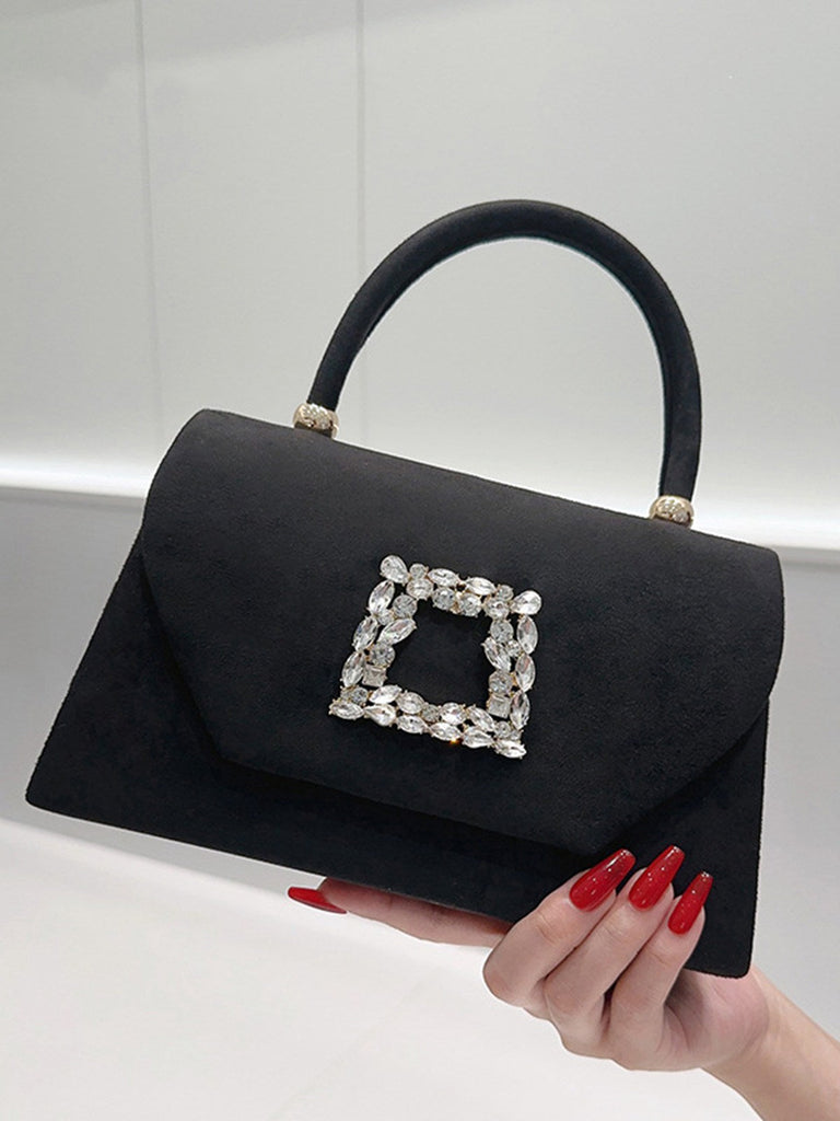 Pochette enveloppe noire avec poignée supérieure et strass