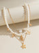 Collier chaîne superposée en perles coquillages et étoiles de mer