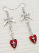 Boucles d'oreilles gothiques en croix de cœur et nœud papillon