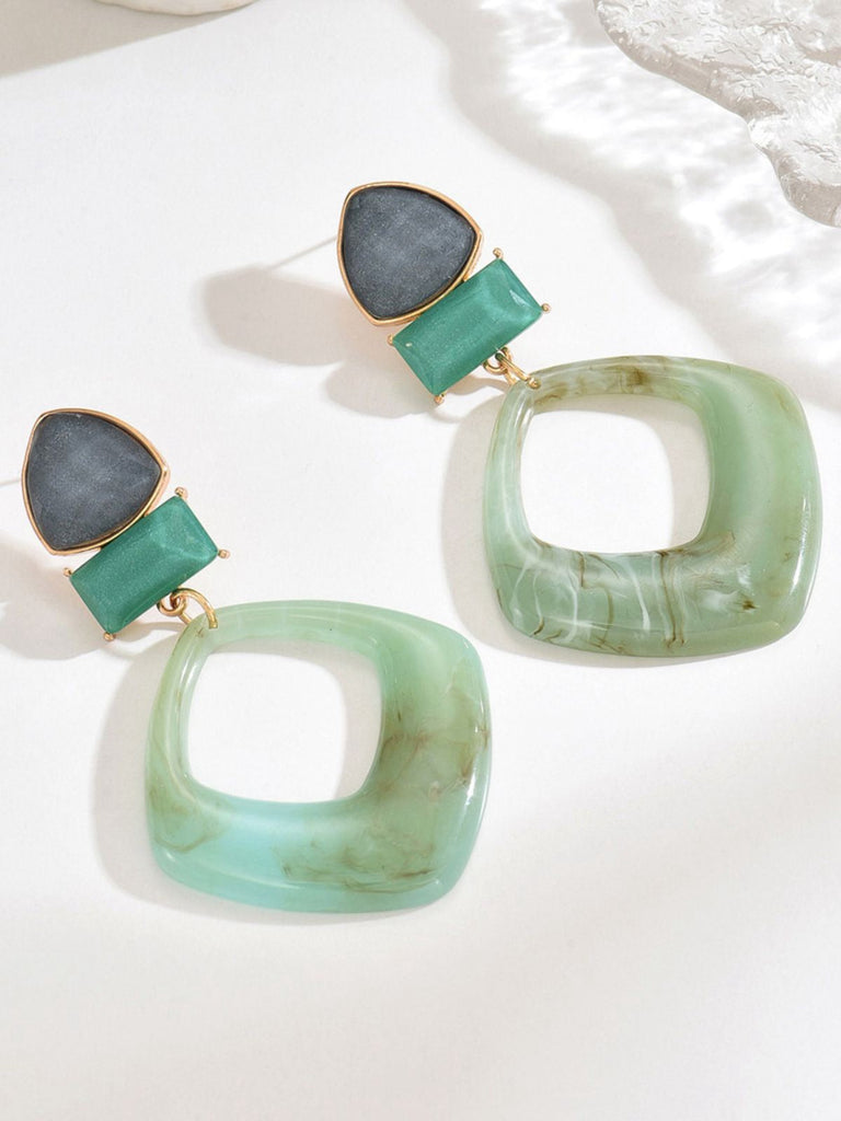 Boucles d'oreilles vintage en résine marbrée à motif géométrique exagéré