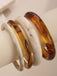 4PCS Ensemble de bracelets joncs empilables en résine marbrée ambre et ivoire - 1