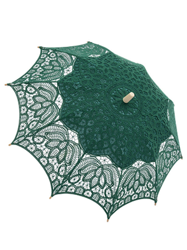 Parapluie vert ajouré en dentelle florale