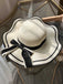 Chapeau de plage vintage à bords ondulés avec nœud
