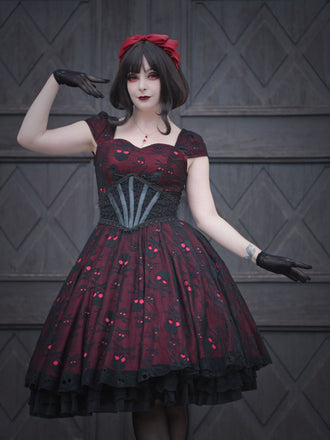 Robe trapèze en maille tête de mort rouge vin des années 1950