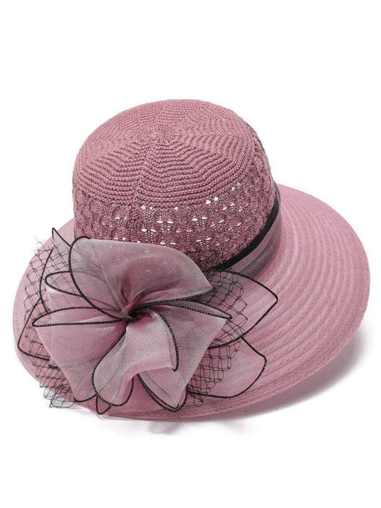 Chapeau de soleil en paille avec nœud papillon en organza au crochet