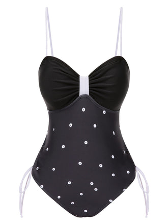 Maillot de bain noir à pois avec nœud papillon des années 1950