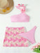 Ensemble bikini dos nu et cache-maillot rose roses 3D années 1960