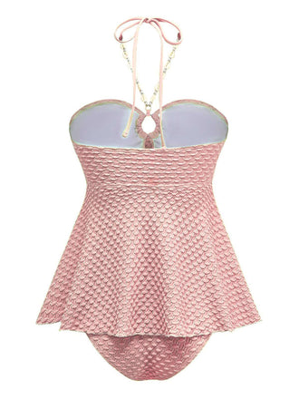 Maillot de bain dos nu à lacets et chaîne coquillages des années 1940