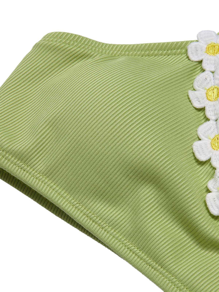 Maillot de bain marguerite en tricot vert clair des années 1960