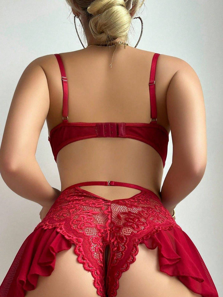 Nuisette dentelle motifs floraux noire années 1960