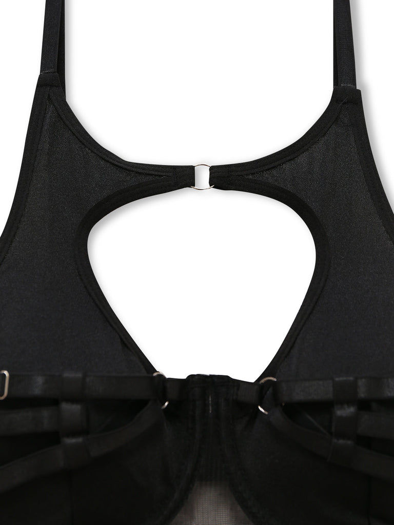 Ensemble lingerie sexy noir à bretelles et découpes années 1950