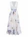 White dress with floral pattern and blue belt on a white background