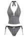 Retro black plaid halter tankini set featuring deep V-neck styling and classic 1960s charm, ideal for summer swimming and beachside activities